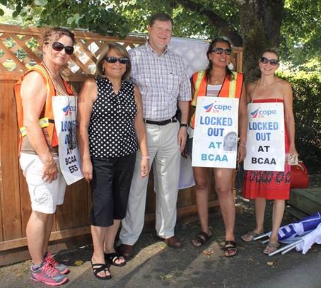 FPSE Secretary-Treasurer Terri Van Steinburg and President George Davison with locked out COPE 378 members.