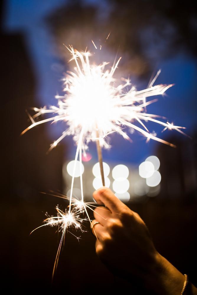 Hand holding a sparkler