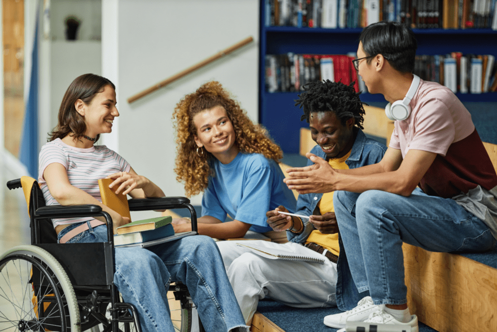 Diverse group of students seated in library